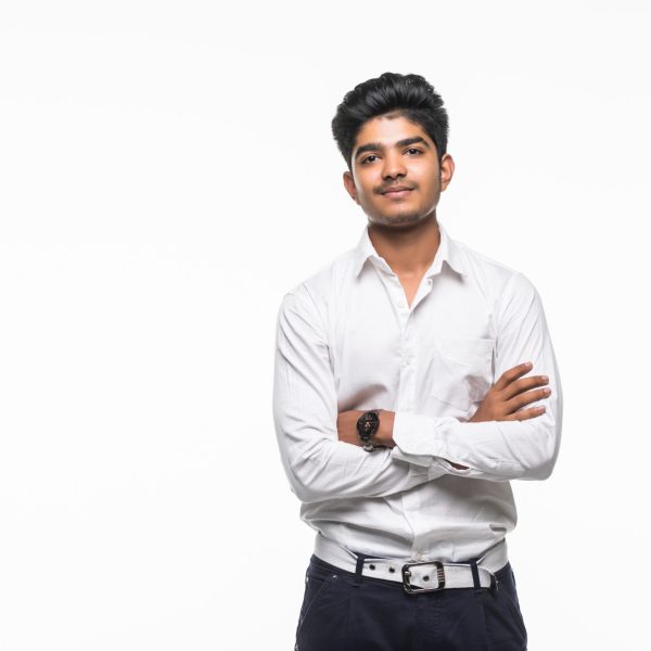 Indian business posing, isolated on a white background.